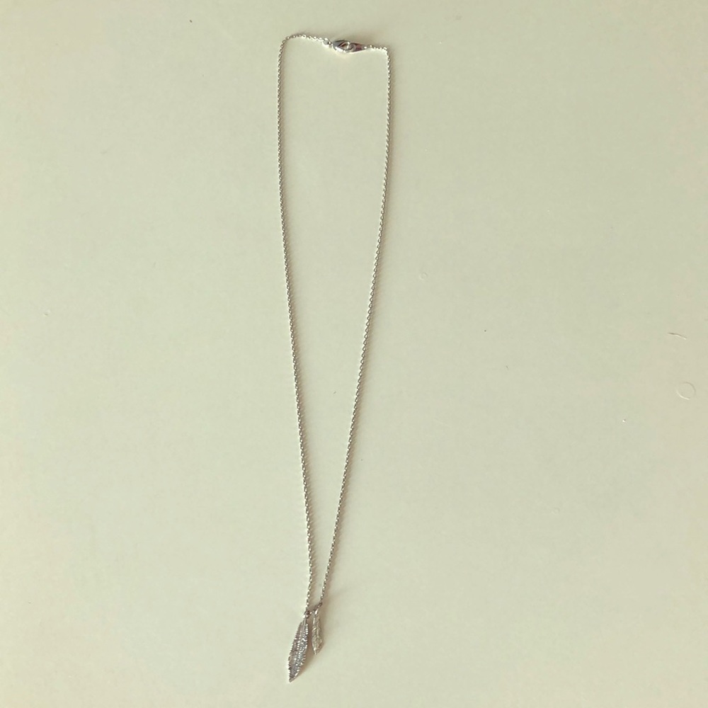 Silver feather pendant necklace